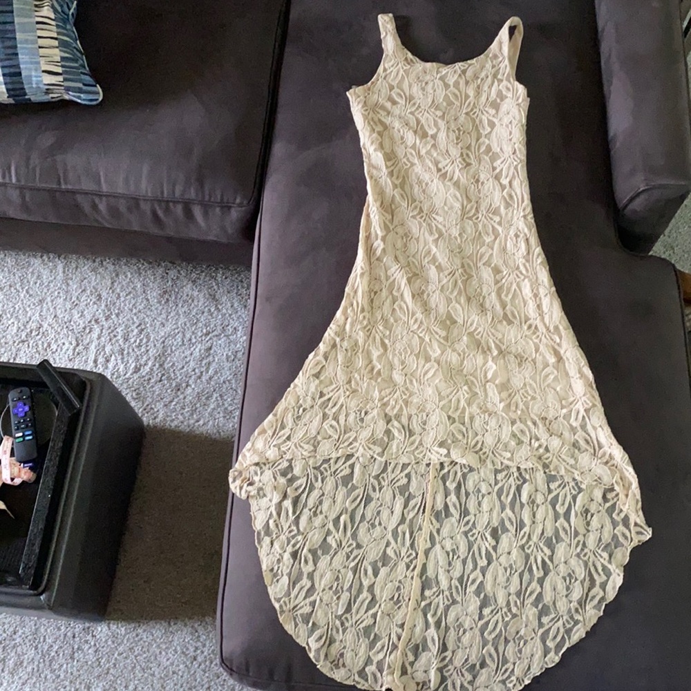 Nude sheer sleeveless hi-low dress